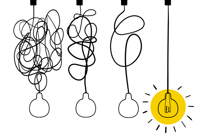 Four drawings of a lightbulb hanging from the ceiling. At left, the cord holding the bulb is completely snarled. In each subsequent drawing, the cord becomes less tangled, until in the final image, it hangs fully straight and the bulb is turned on, shining yellow.